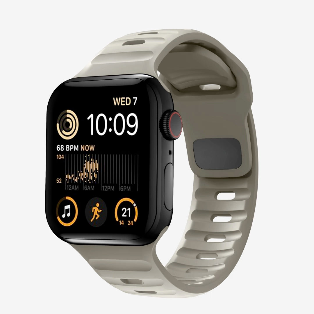 A starlight colour silicon watch strap for apple watch series 8 45mm designed for sports and active activities