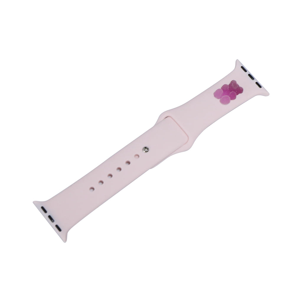 A small purple 3D printed gummy bear attached to a pink silicon watch strap for the apple watch