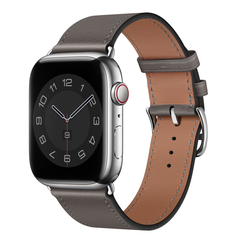 A dark grey colour genuine leather single tour watch strap on an apple watch series 8
