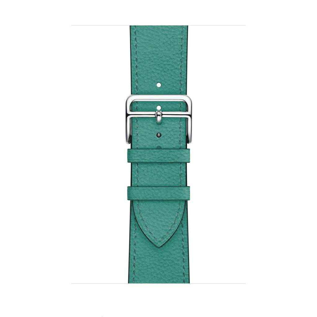 A turquoise colour genuine leather single tour watch strap on the latest apple watch