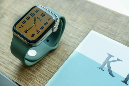 An Apple watch series 8 44mm with a pine green colour silicon sport band