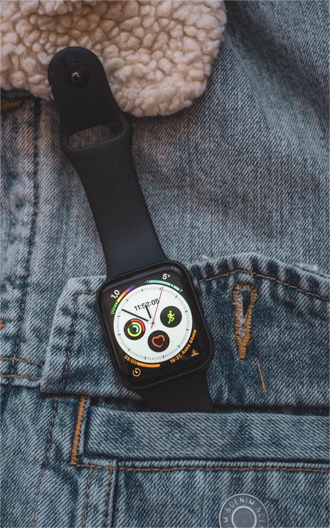 black silicon apple watch strap on an apple watch series 8 45mm inside a denim jacket pocket