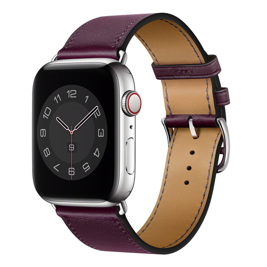 A burgundy red genuine leather single tour watch strap on an apple watch series