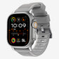 New grey silicon with metal connectors, pin and buckle watch strap with compression grooves designed for apple watch series 9 45mm and ultra 2 side angle