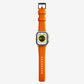 New orange silicon with metal connectors, pin and buckle watch strap with compression grooves designed for apple watch series 9 45mm and ultra 2 front view