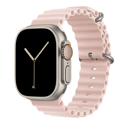 A light pink colour watch strap band made from silicone  with two metal buckles on an Apple watch series 11 42mm/ 45mm/ 46mm and ultra 3 designed for the ocean and active sports