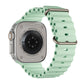 A pistachio green colour watch strap band made from silicone  with two metal buckles on an Apple watch series 10 42mm/ 45mm/ 46mm and ultra 2 designed for the ocean and active sports