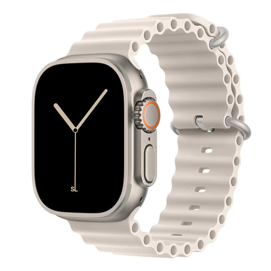 A starlight colour watch strap band made from silicone  with two metal buckles on an Apple watch series 10 42mm/ 45mm/ 46mm and ultra 2 designed for the ocean and active sports