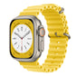 A yellow silicon watch strap on an apple watch ultra designed for the ocean