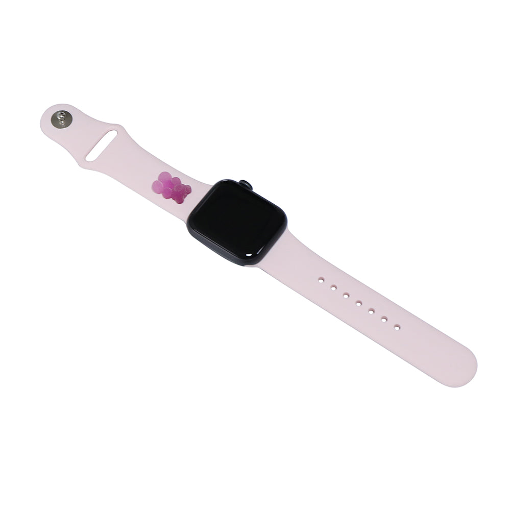 A small purple 3D printed gummy bear attached to a pink silicon watch band for the apple watch
