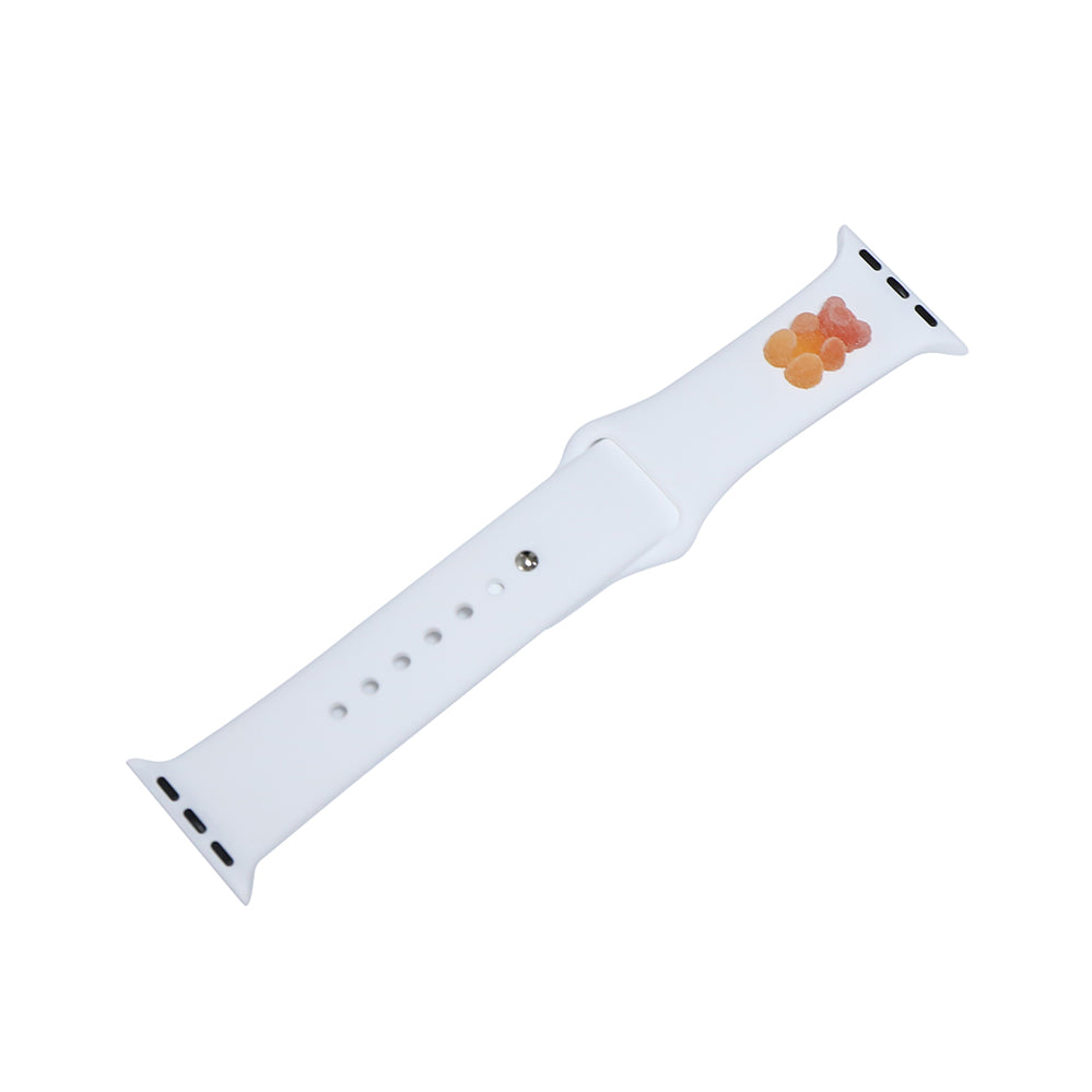 A small red and orange 3D printed gummy bear attached to a white silicon watch band for the apple watch
