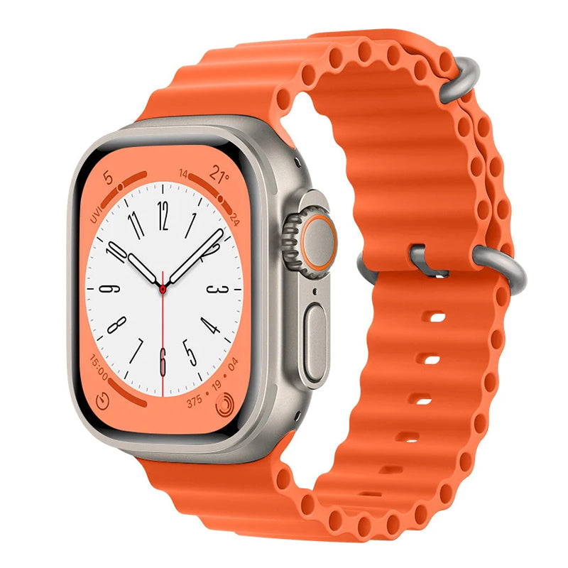 An orange silicon watch strap with two buckles on an apple watch ultra designed for the ocean