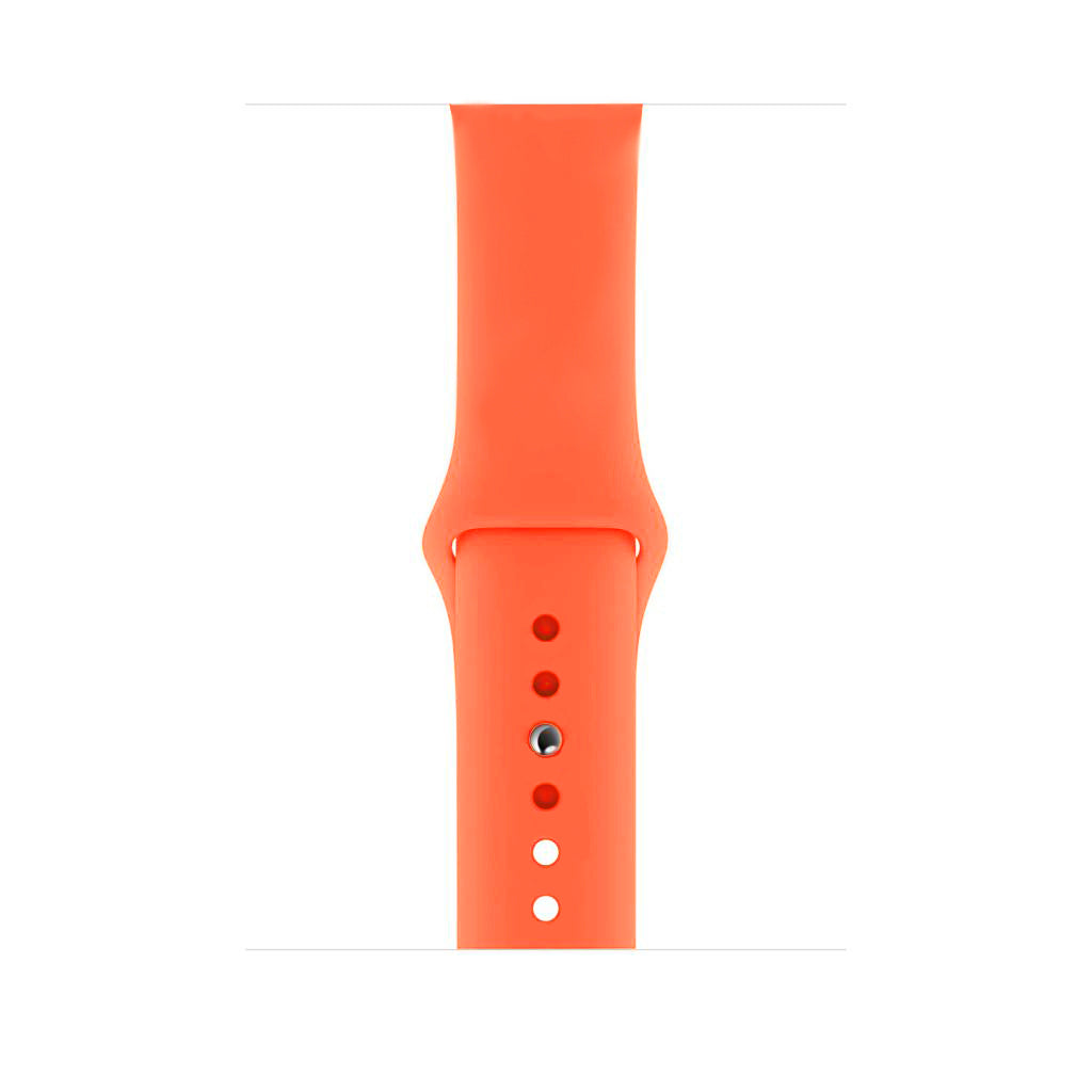 A neon orange colour watch band on an apple watch made from silicon material