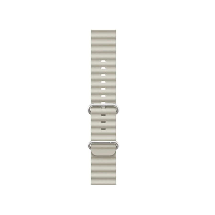 A starlight colour silicon watch strap on an apple watch ultra designed for the ocean