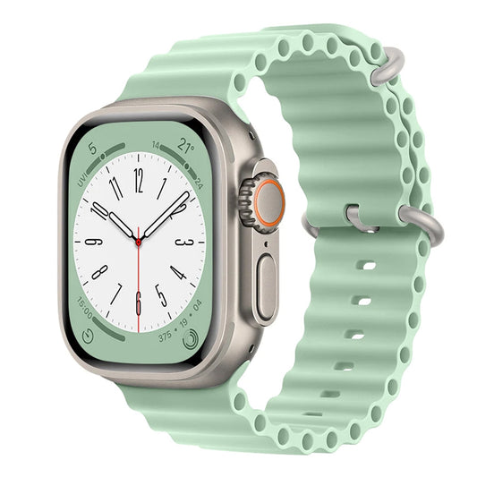 A pistachio green colour silicon watch strap on an apple watch ultra designed for the ocean