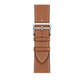 A brown with white stitching genuine leather single tour watch strap on an apple watch series