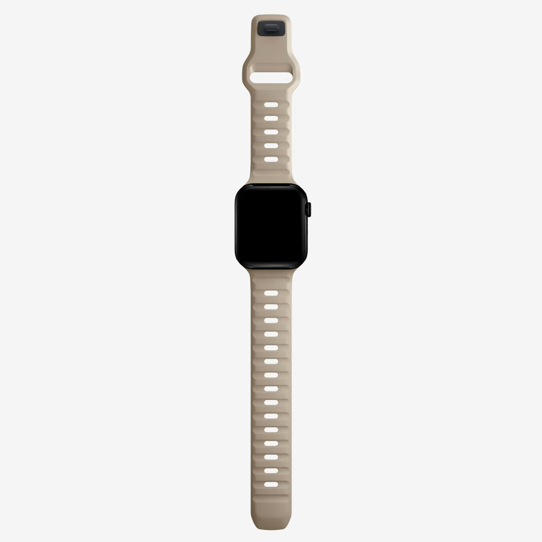 A dune colour silicon watch strap for apple watch ultra designed for active sports and heavy duty activities