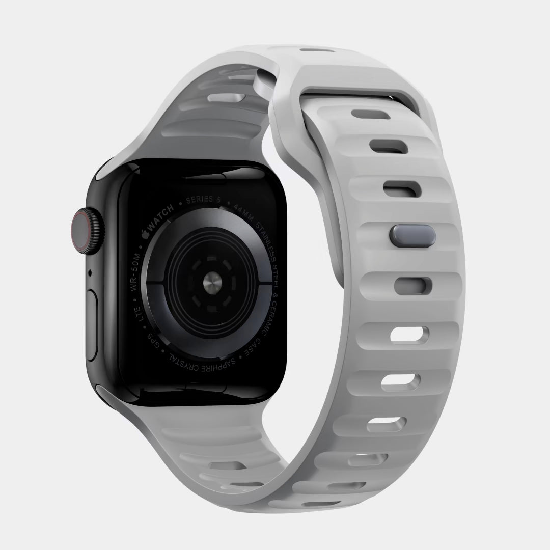 A grey colour silicon watch strap for apple watch ultra designed for active sports and heavy duty activities