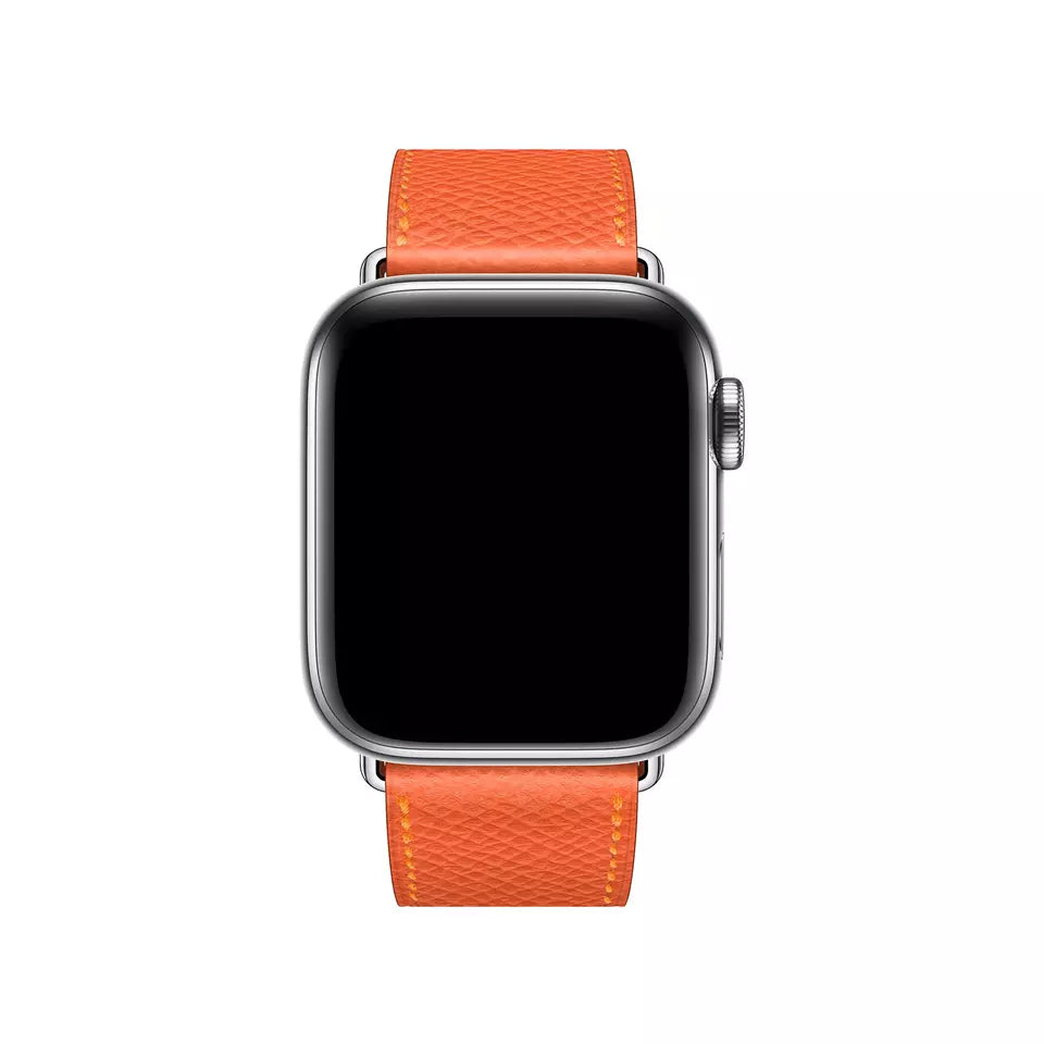 A orange colour genuine leather single tour watch strap on an apple watch series 8