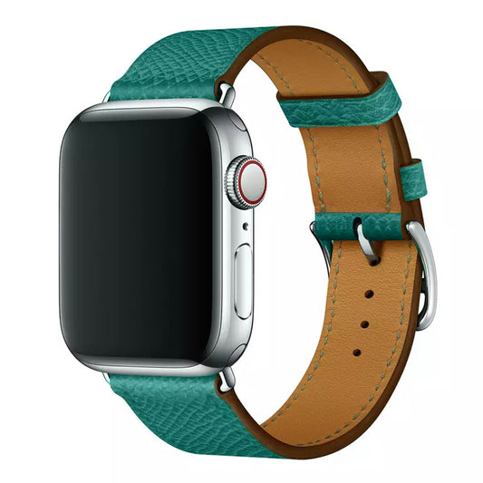 A turquoise colour genuine leather single tour watch strap on the latest apple watch